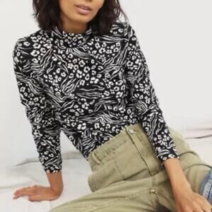 Anthropologie black white animal print mock neck long sleeve.  top size  Small